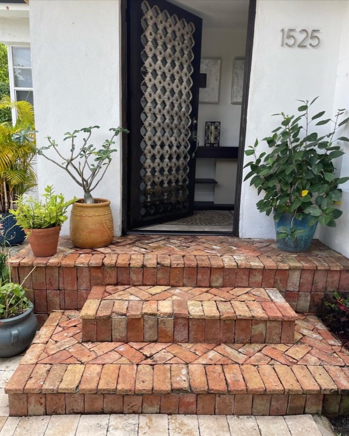 Brick porch steps restored by pressure washing